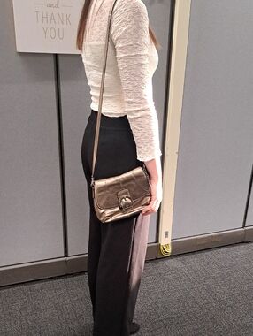 metallic bronze Coach Soho leather crossbody bag